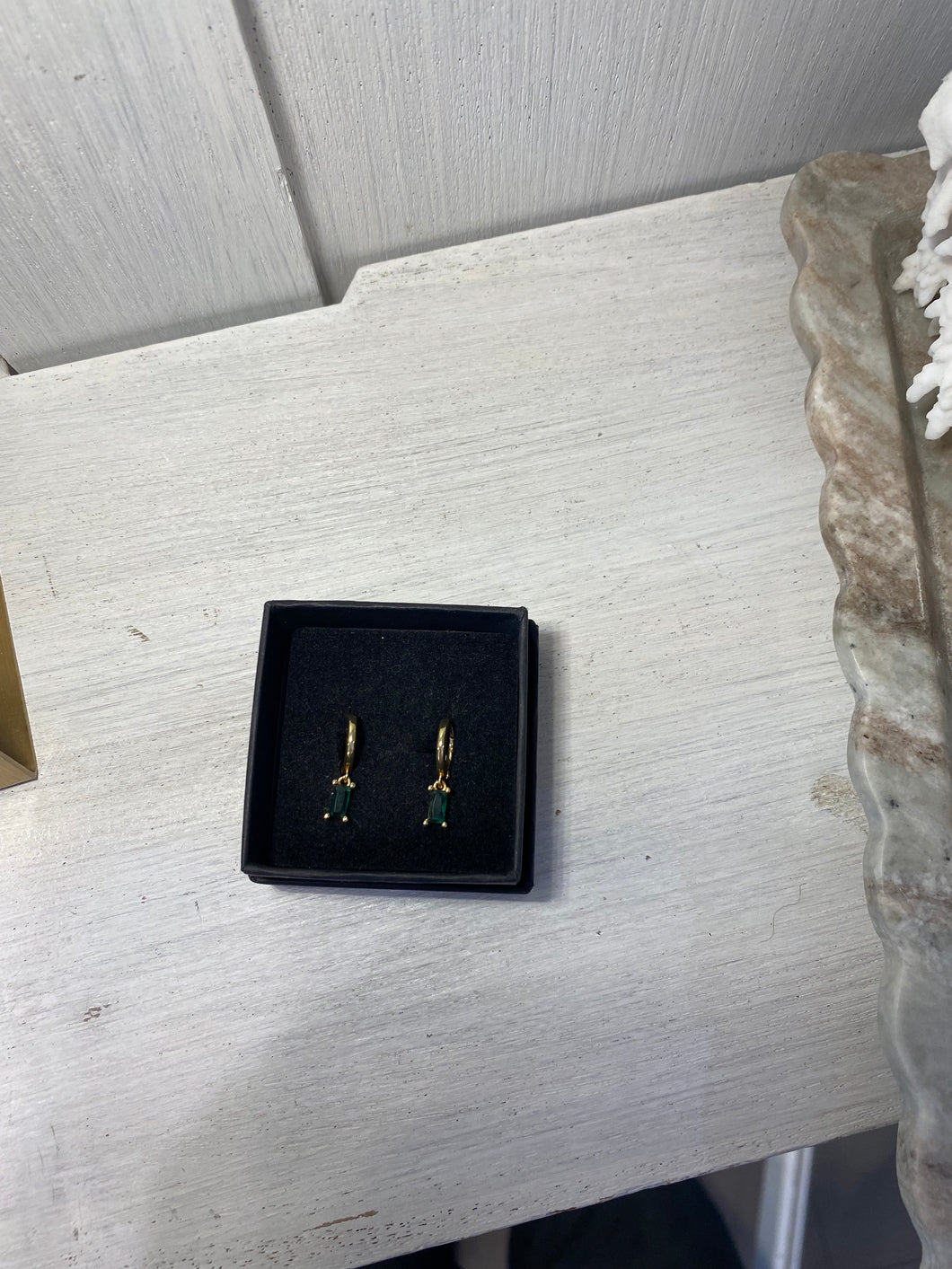 Green hoop earrings